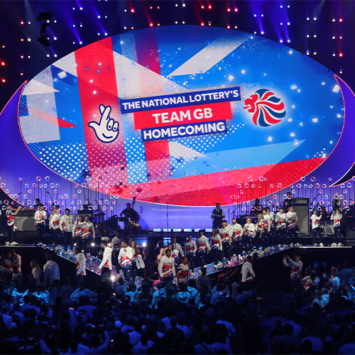 Team Great Britain on stage at AO arena for national lottery homecoming event.